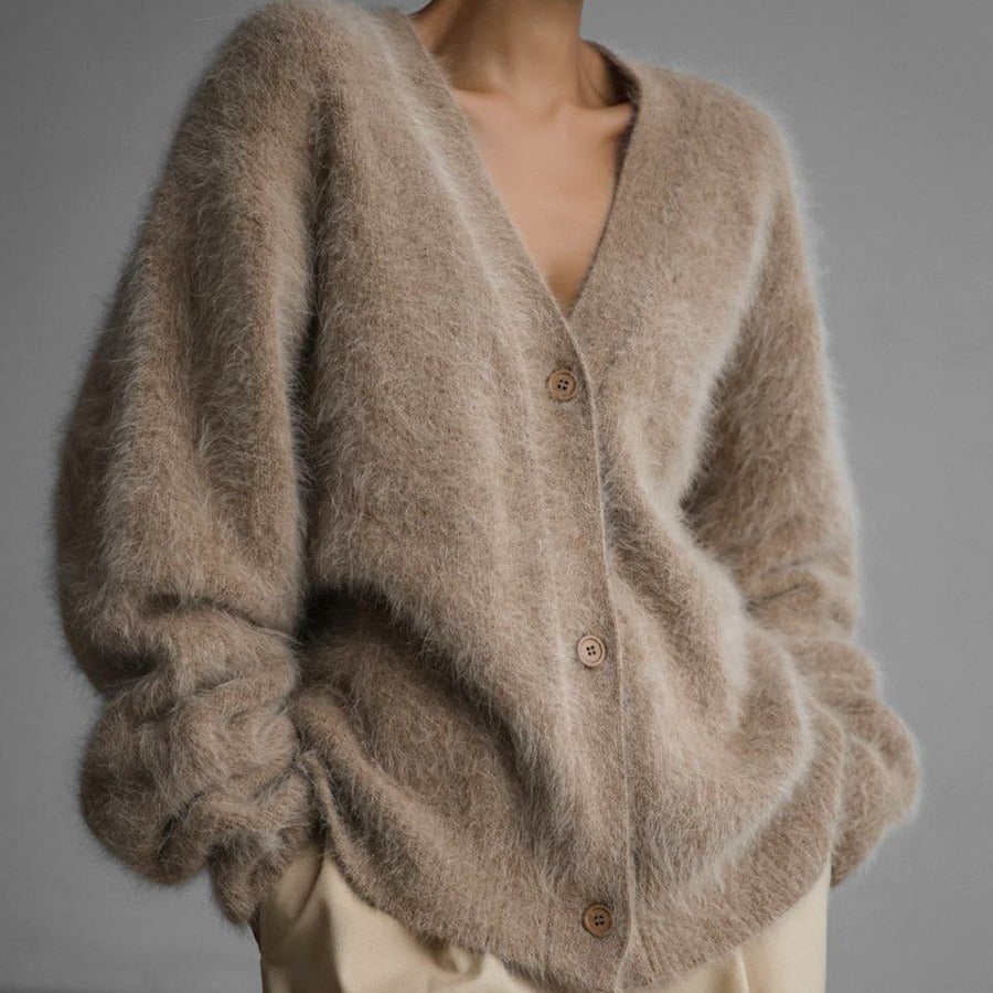 Fluffy oversized V-neck cardigan in beige, front view on model, button front, dropped shoulders, relaxed fit