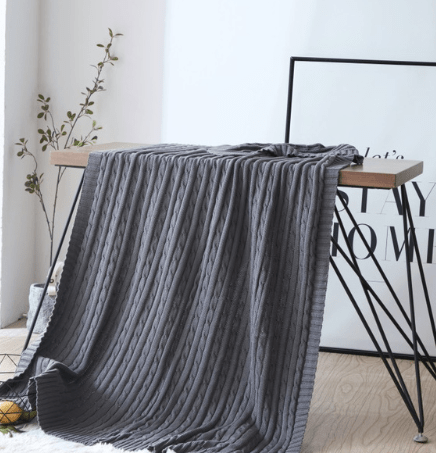 Cable Knit Throw with Ribbed Border in grey