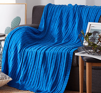Cable Knit Throw with Ribbed Border in blue