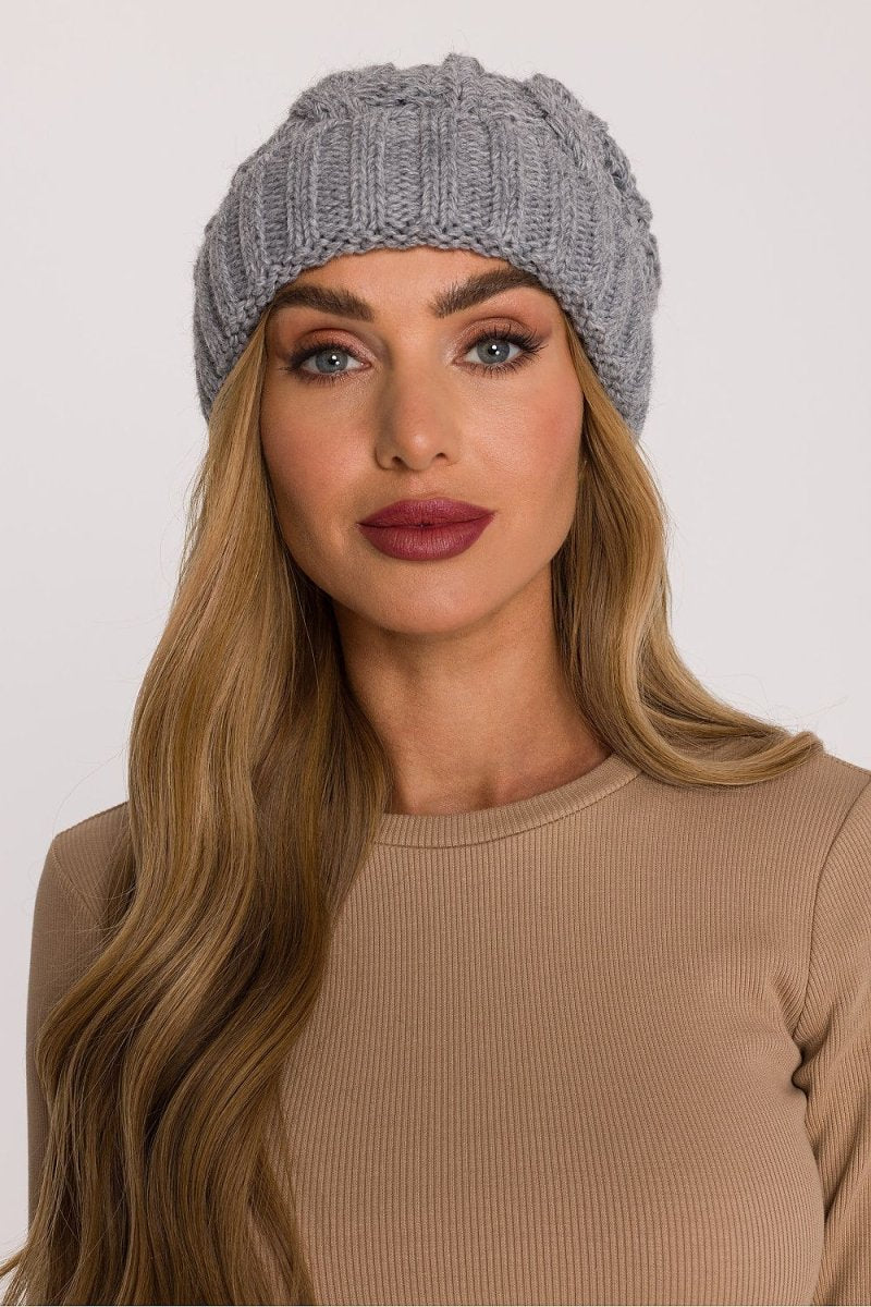 Grey braided knit cap with textured pattern, winter accessory by Moe