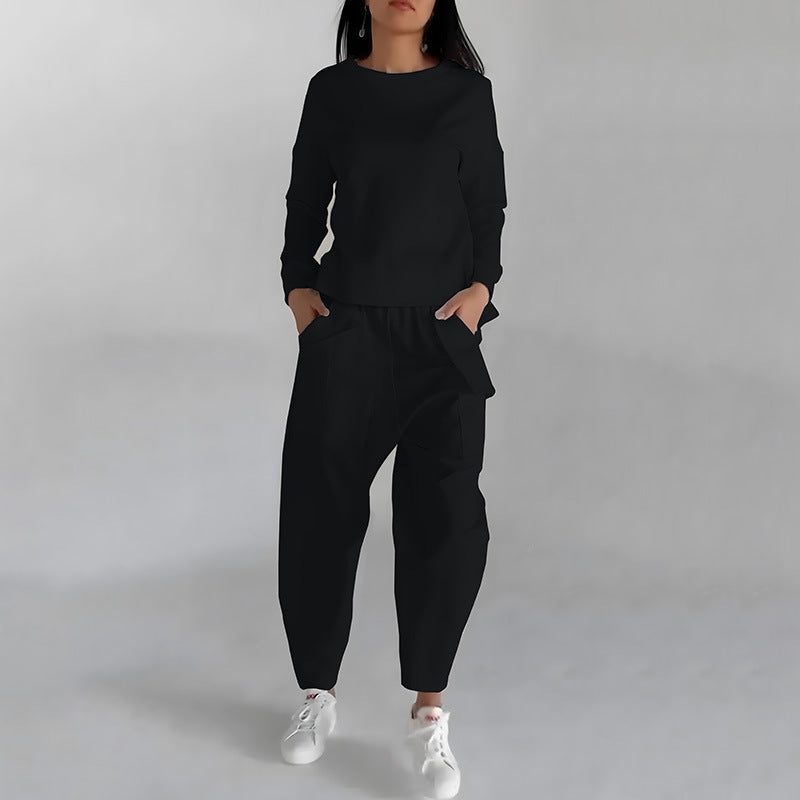 Black round-neck sweatshirt and jogger trousers set, front view on model