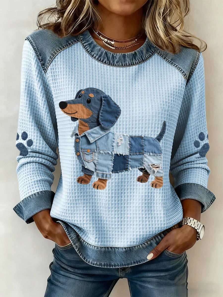 Long-sleeve waffle-knit top with denim-look yoke and dachshund patch, front view on model
