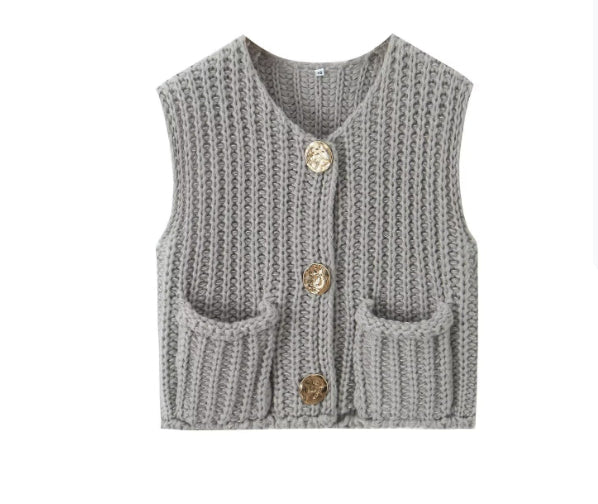 Chunky knit vest in grey with gold-tone buttons and patch pockets