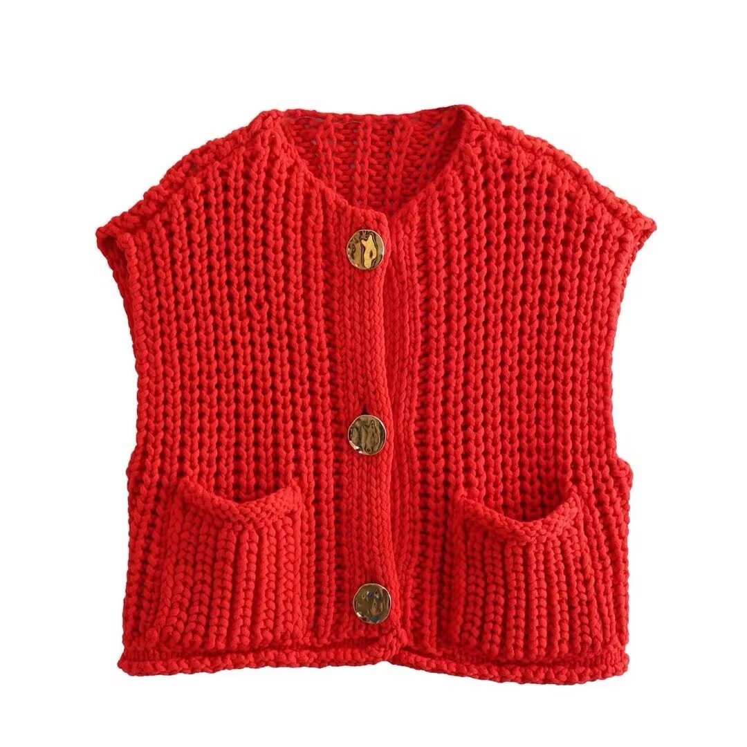 Front of the red knit vest with three gold-tone buttons and two patch pockets