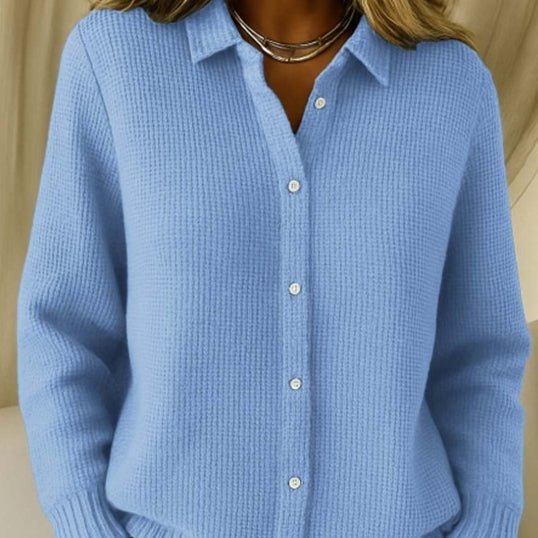 Close-up of the sky blue waffle-knit sweater: collar, button placket and knit texture