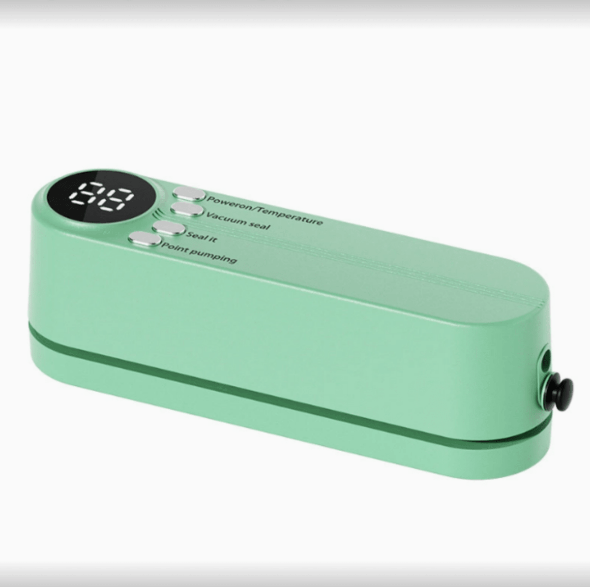 Green vacuum sealer on white, side view with the small black knob