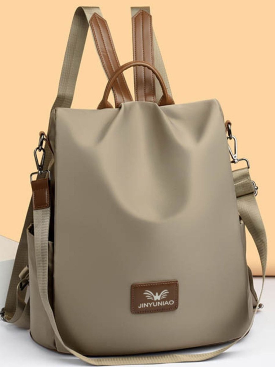 Convertible Backpack Bag - Water-Resistant Travel & Work Tote in black nylon with adjustable straps and zippered compartments