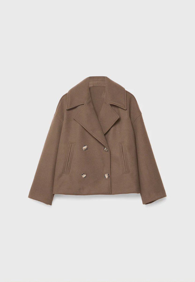 Camel cropped jacket laid flat