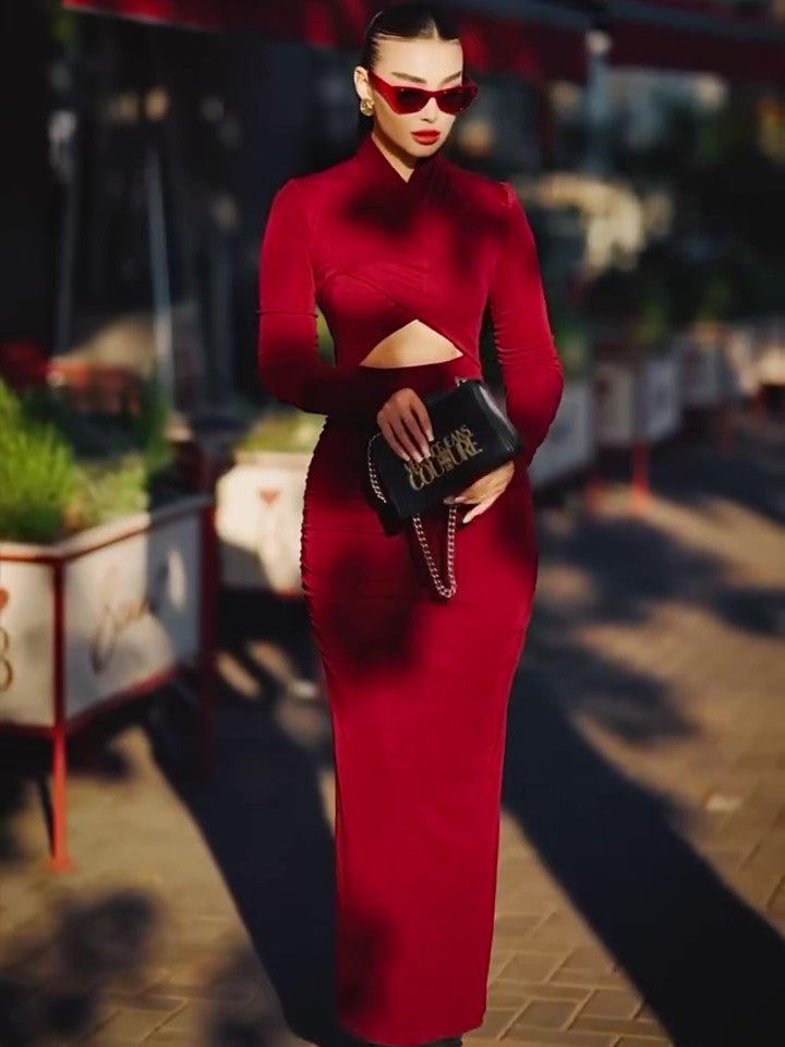 Red maxi dress with crossover bodice, worn with red sunglasses and a black chain bag