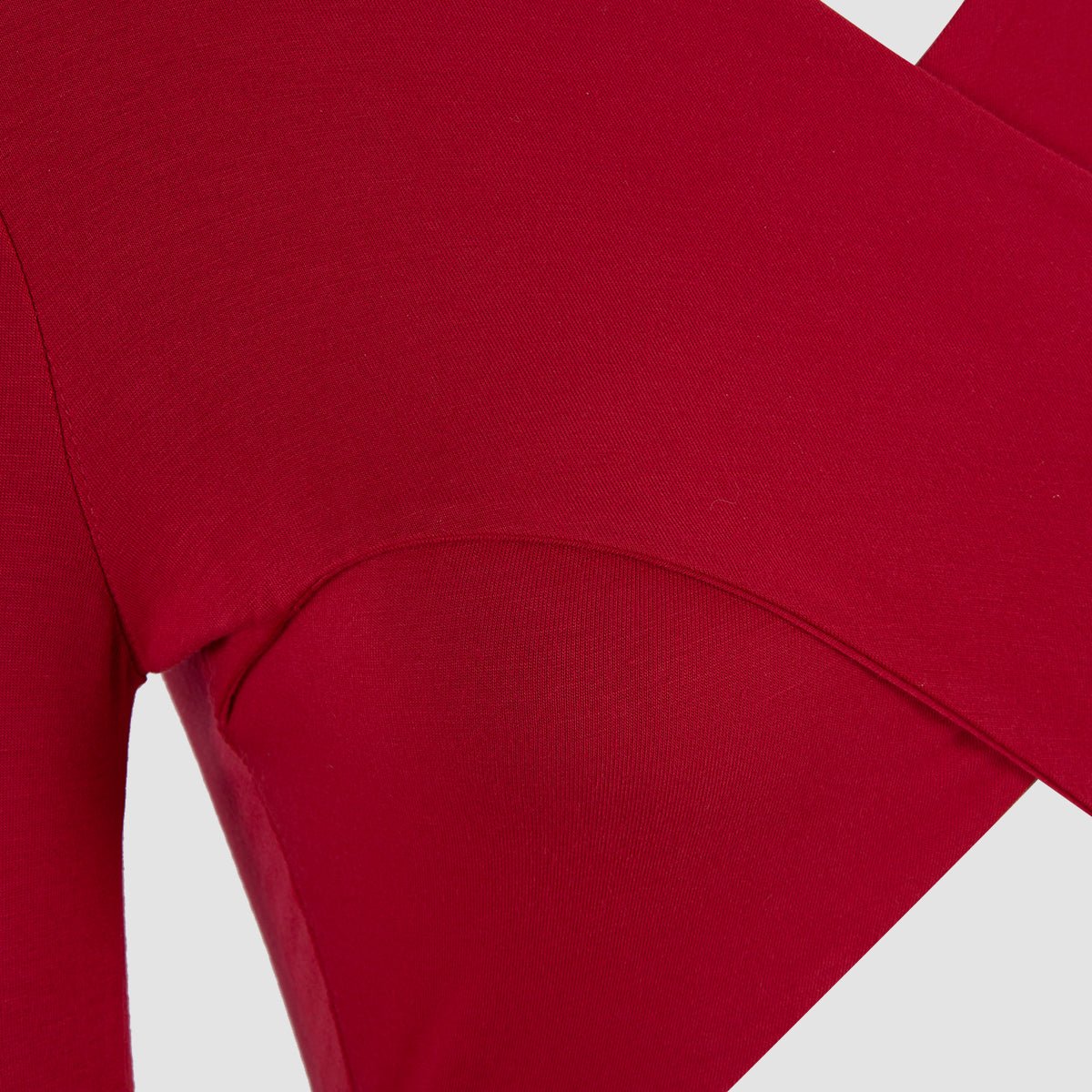Close-up of the edge of the waist cut-out and the sleeve