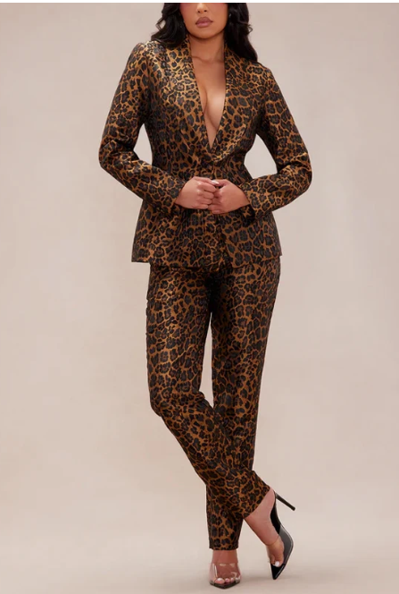 Leopard print blazer and slim trouser suit on model, front view, full length, black heels, neutral background