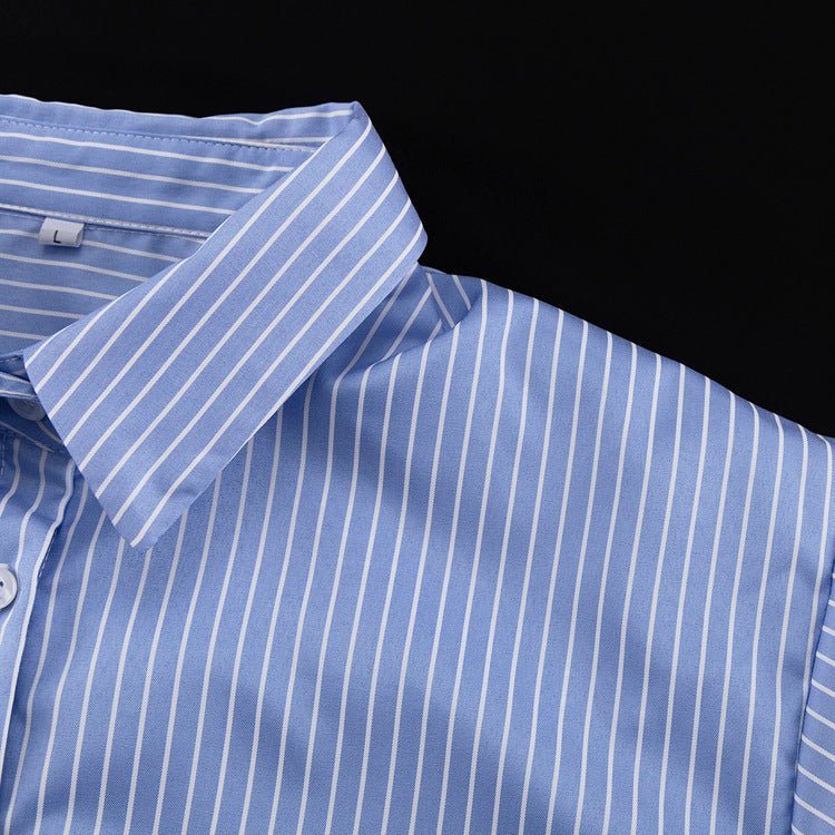 Close-up of the blue and white striped shirt collar from the side