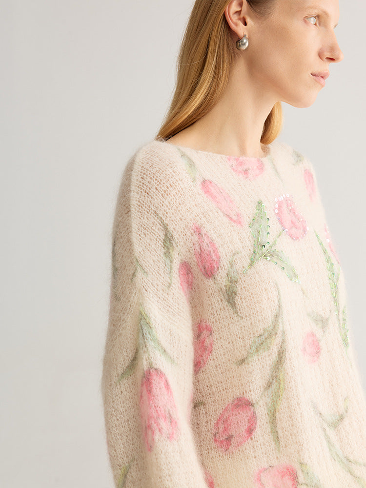 Tulip and floral print fuzzy knit jumper, wide neck, cream with pink flowers, side view on model, studio setting
