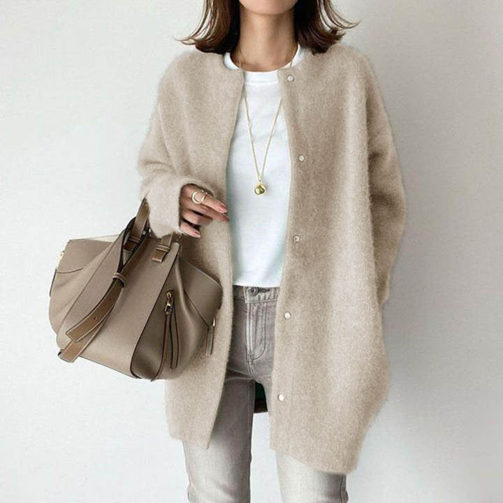 Loose knit cardigan coat in beige, front view on model, round neck, button front, knee-length, relaxed fit
