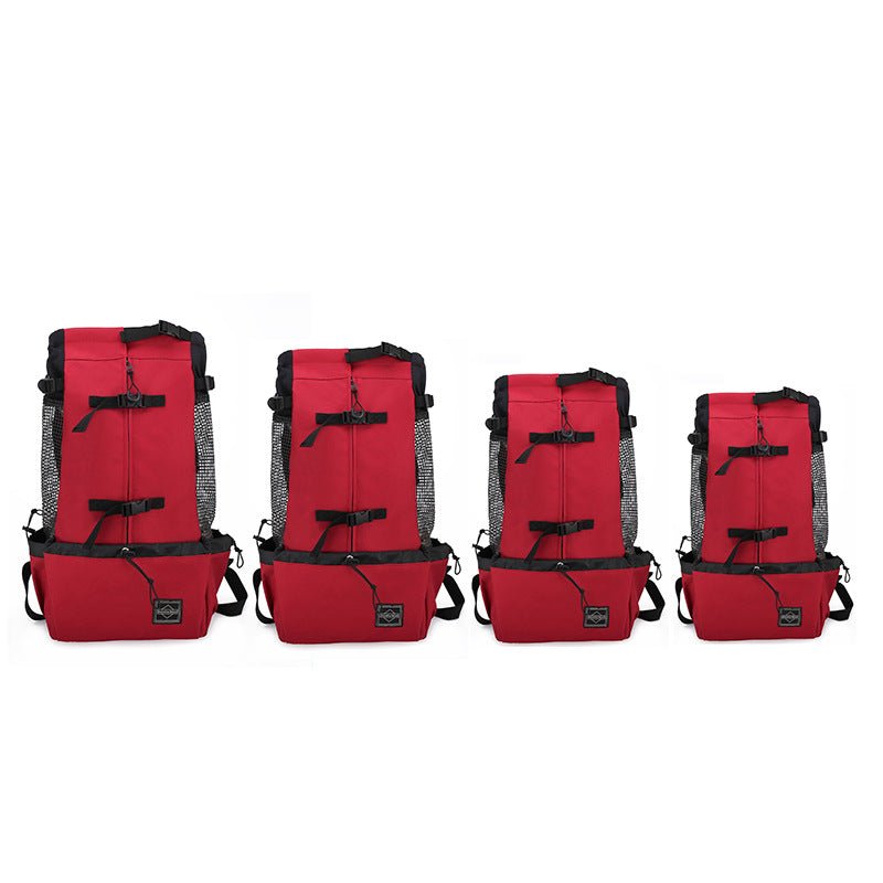 Four red dog backpack carriers side by side, from the largest to the smallest size