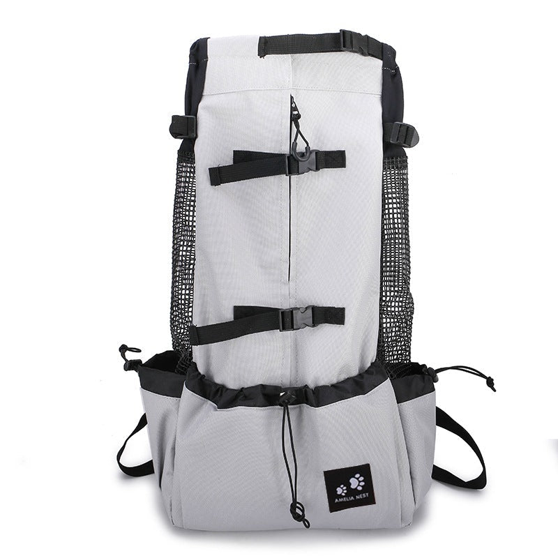 Light grey dog backpack carrier on a white background, front view
