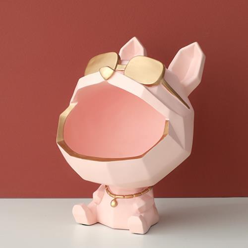 Pink dog figure catch-all with gold-tone sunglasses and a collar with a small pendant