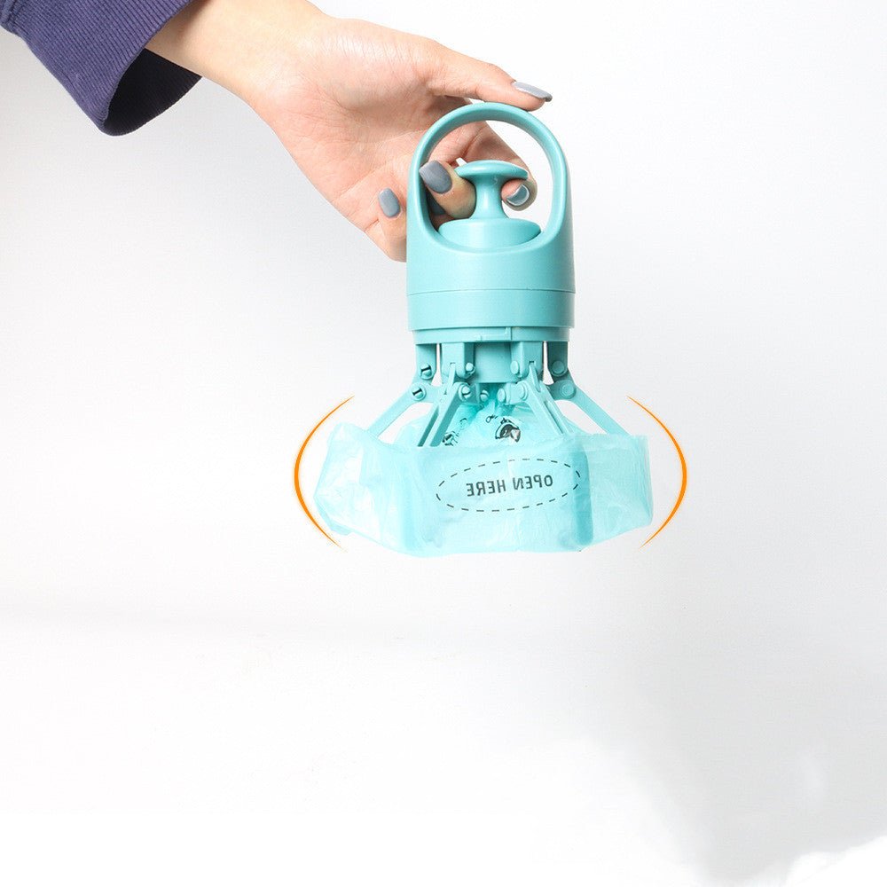 Teal poop picker held by its handle with a light blue bag stretched between the claws