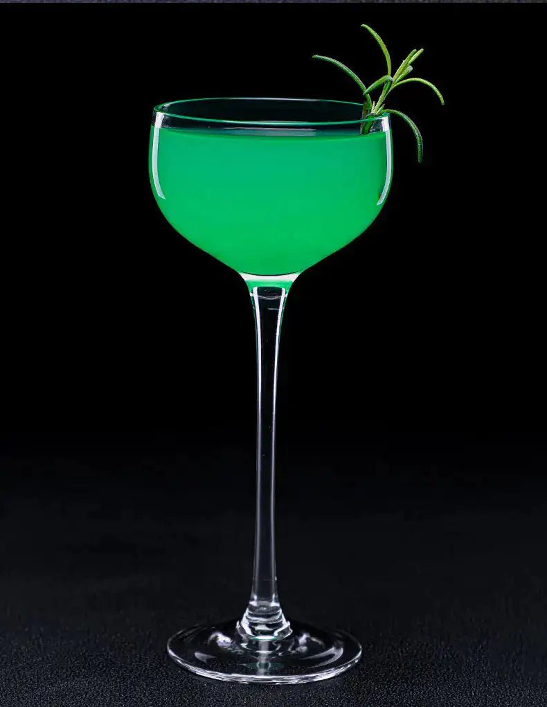 Elegant crystal cocktail glass with delicate stem and clear bowl, showcasing modern barware design