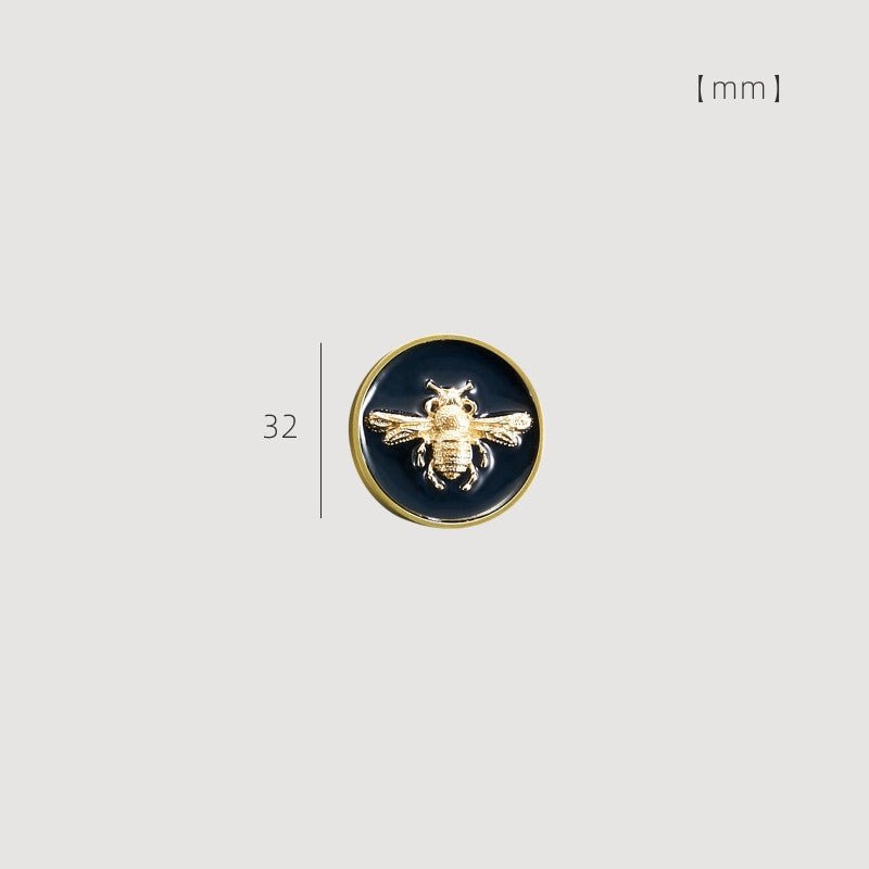 Enamelled cabinet knob with a gold-tone bee on dark blue, 32 mm