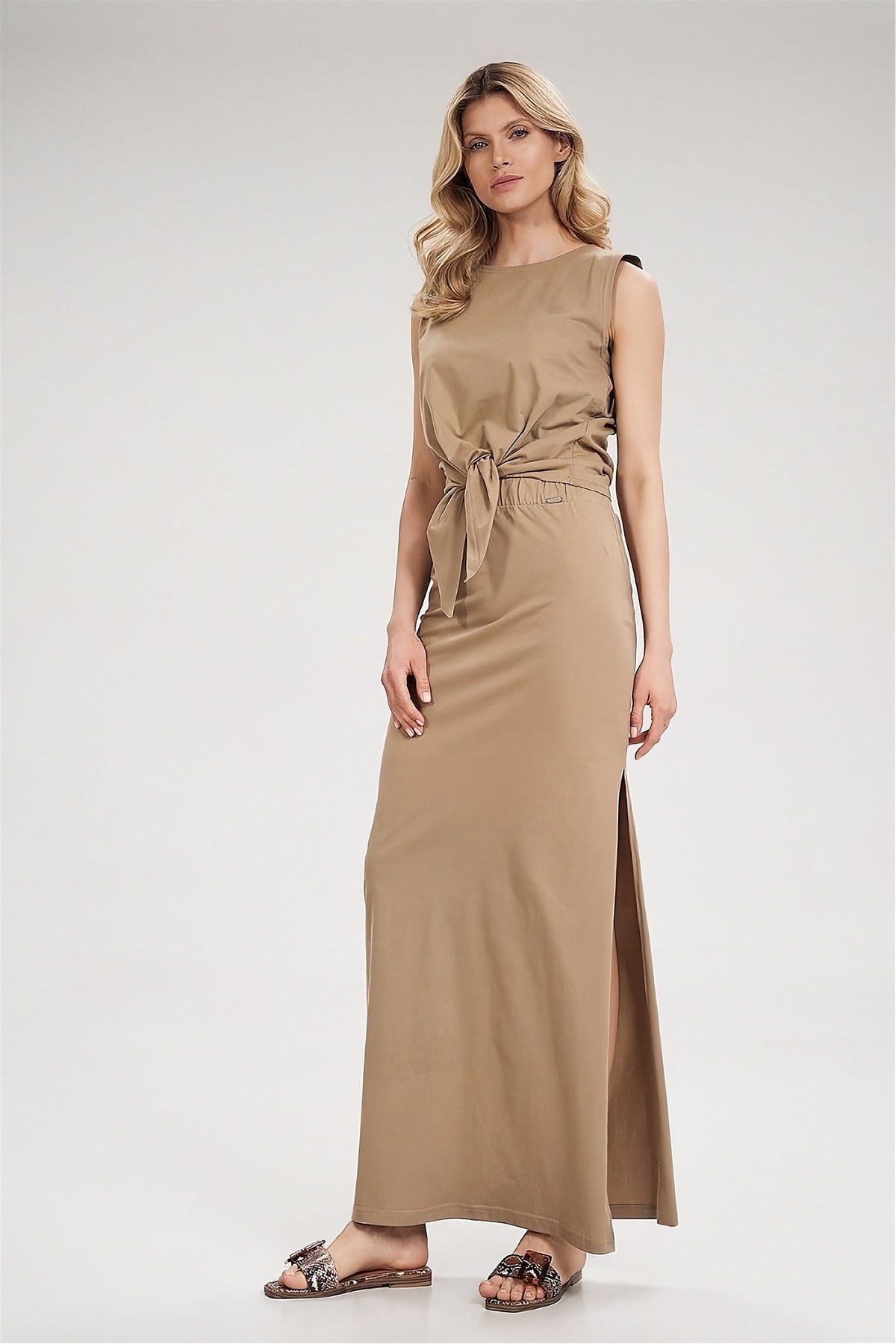 Beige cotton maxi skirt by Figl with side slit, front view, worn with a matching top that is not included