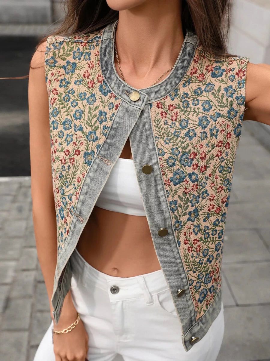 Floral Embroidered Denim Vest Top in light wash denim with delicate floral embroidery on the chest and back. Model wearing re