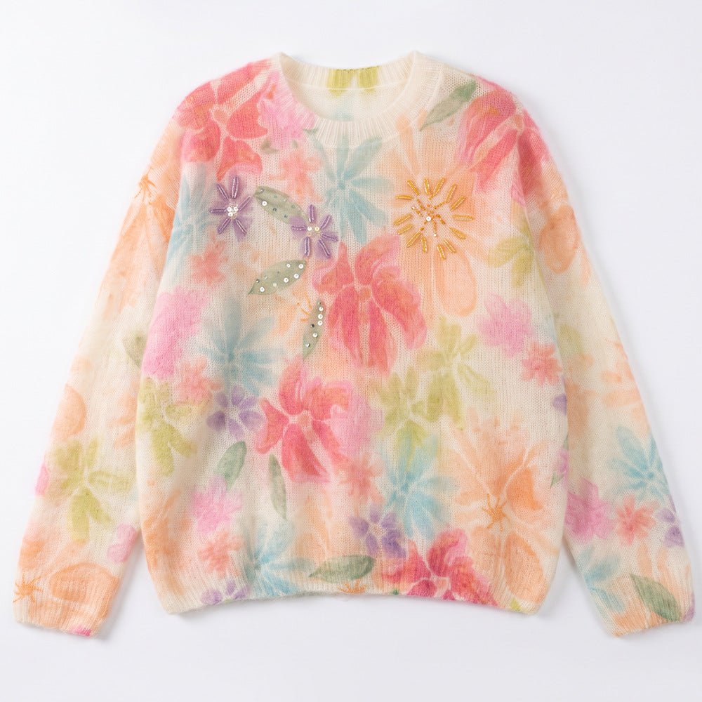 Coral floral jumper laid flat, large coral, pink and turquoise flowers