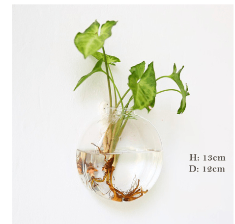 Round glass wall vase with a cutting, marked 13 cm high and 12 cm across