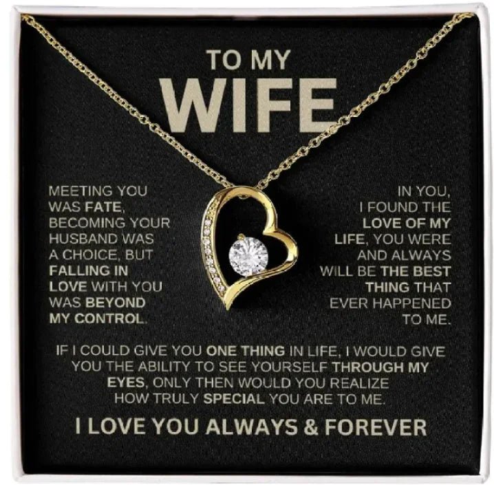 Gold-tone hollow heart pendant with rhinestones on silver chain, elegant fashion necklace for women