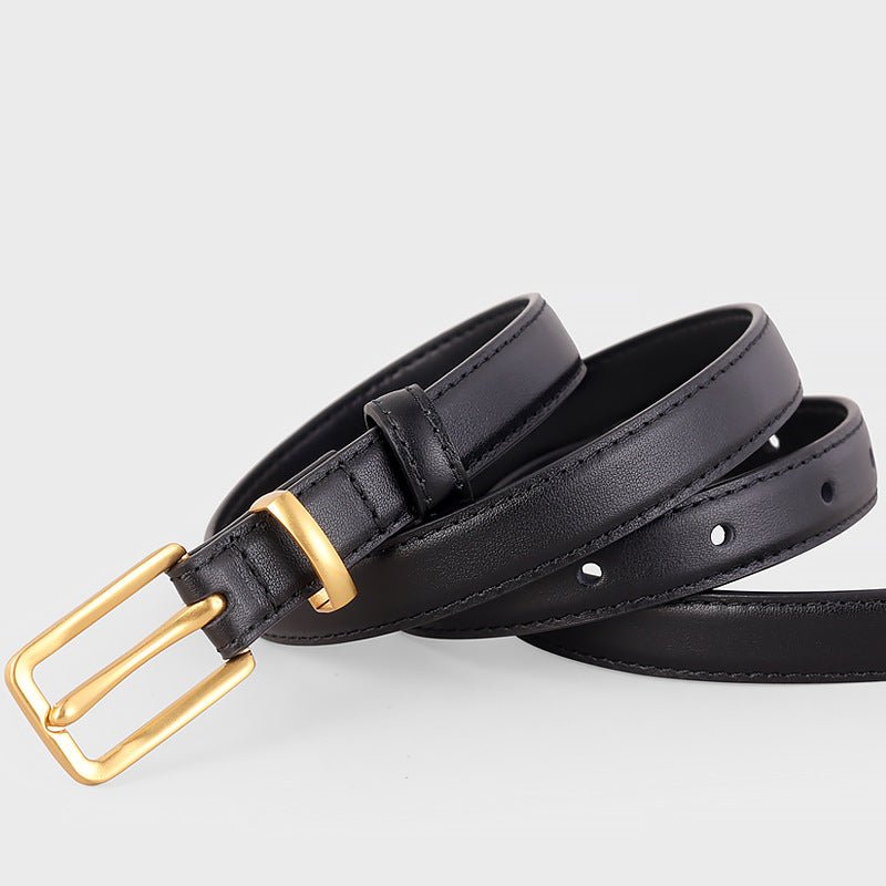 Black leather skinny belt with golden buckle closure, premium cowhide detail — Leather Skinny Belt