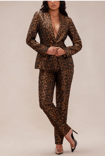 Leopard print blazer and slim trouser suit on model, front view, full length, black heels, neutral background