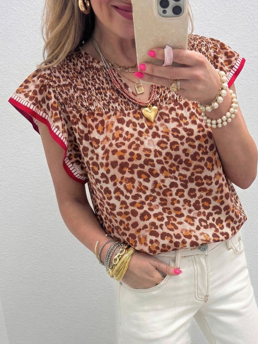 Leopard Print Smocked Notched Blouse – bold fashion blouse with notched neckline and smocked bodice