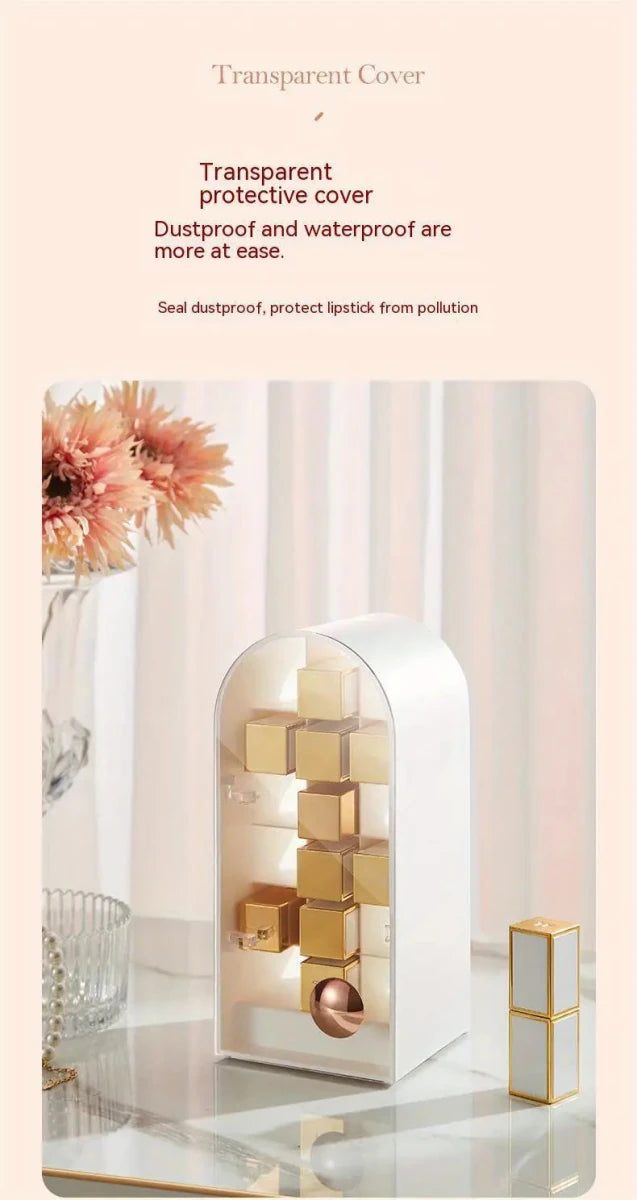 White organizer with its clear cover closed over the lipsticks, flowers in the background