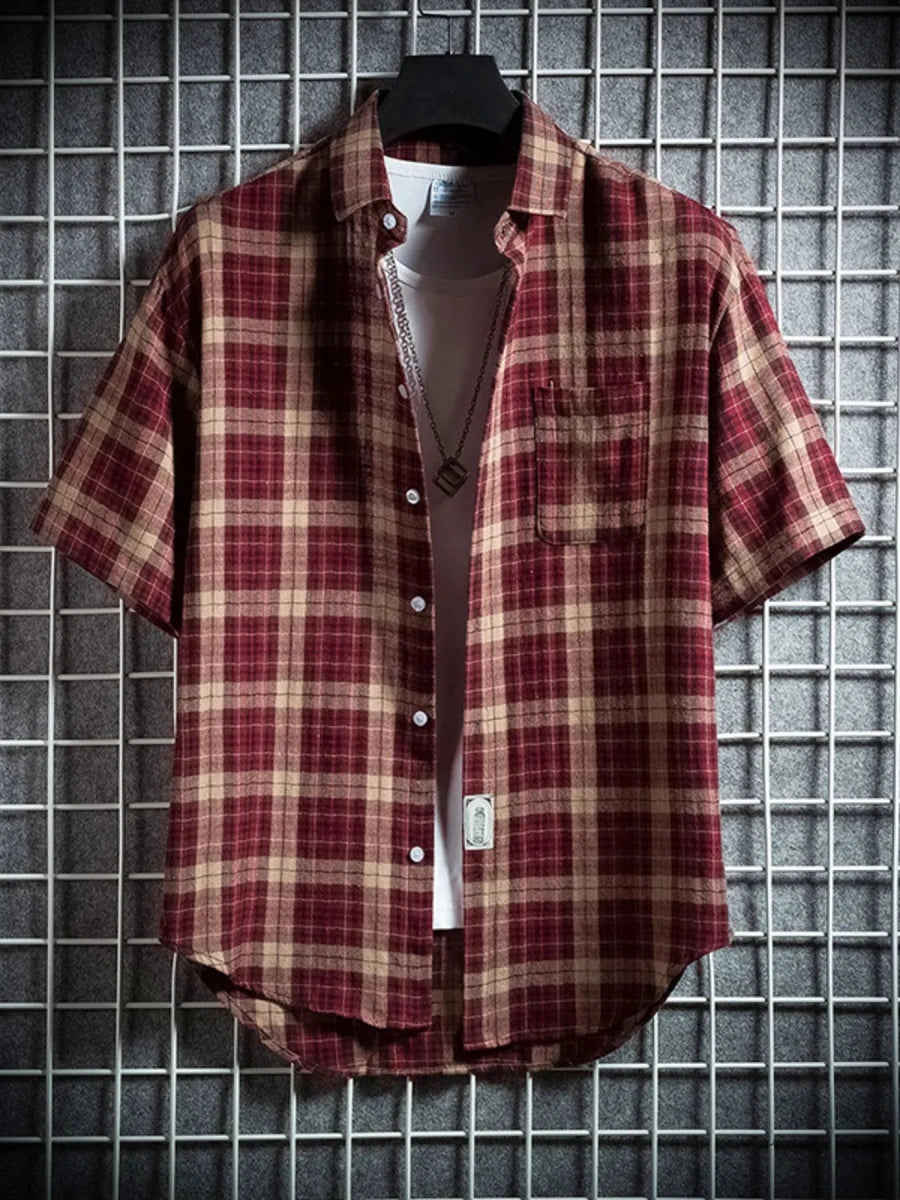 Men's Plus Size Casual Plaid Short Sleeve Shirt in navy plaid on a model – breathable cotton spandex comfort