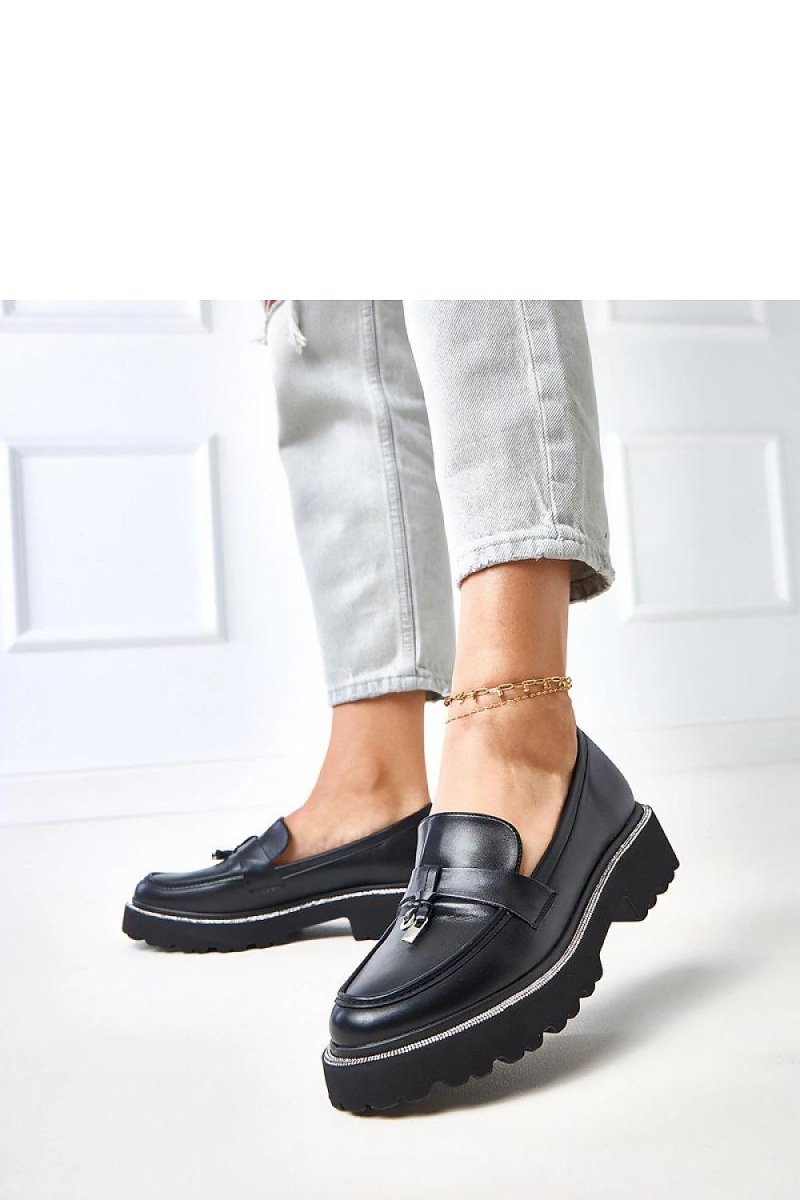 Elegant black moccasin shoes for women with soft suede-like finish and flexible sole, perfect for casual wear at WowStore.liv