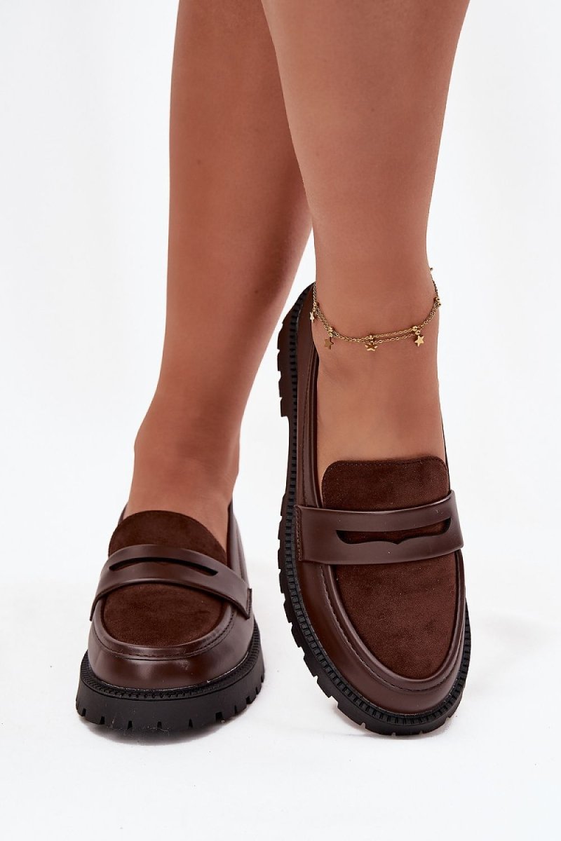 Model wearing brown moccasins with business casual outfit