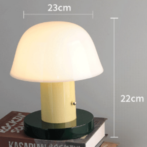 Mushroom Rechargeable Desk Lamp glowing softly on wooden desk workspace