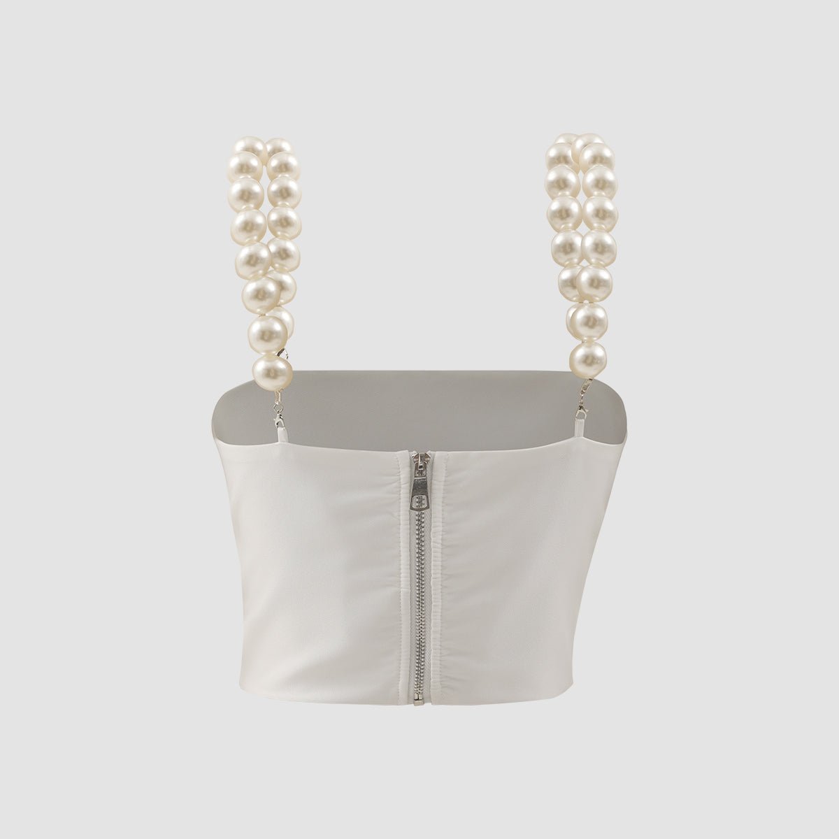Back view of the top with a zip at the centre back