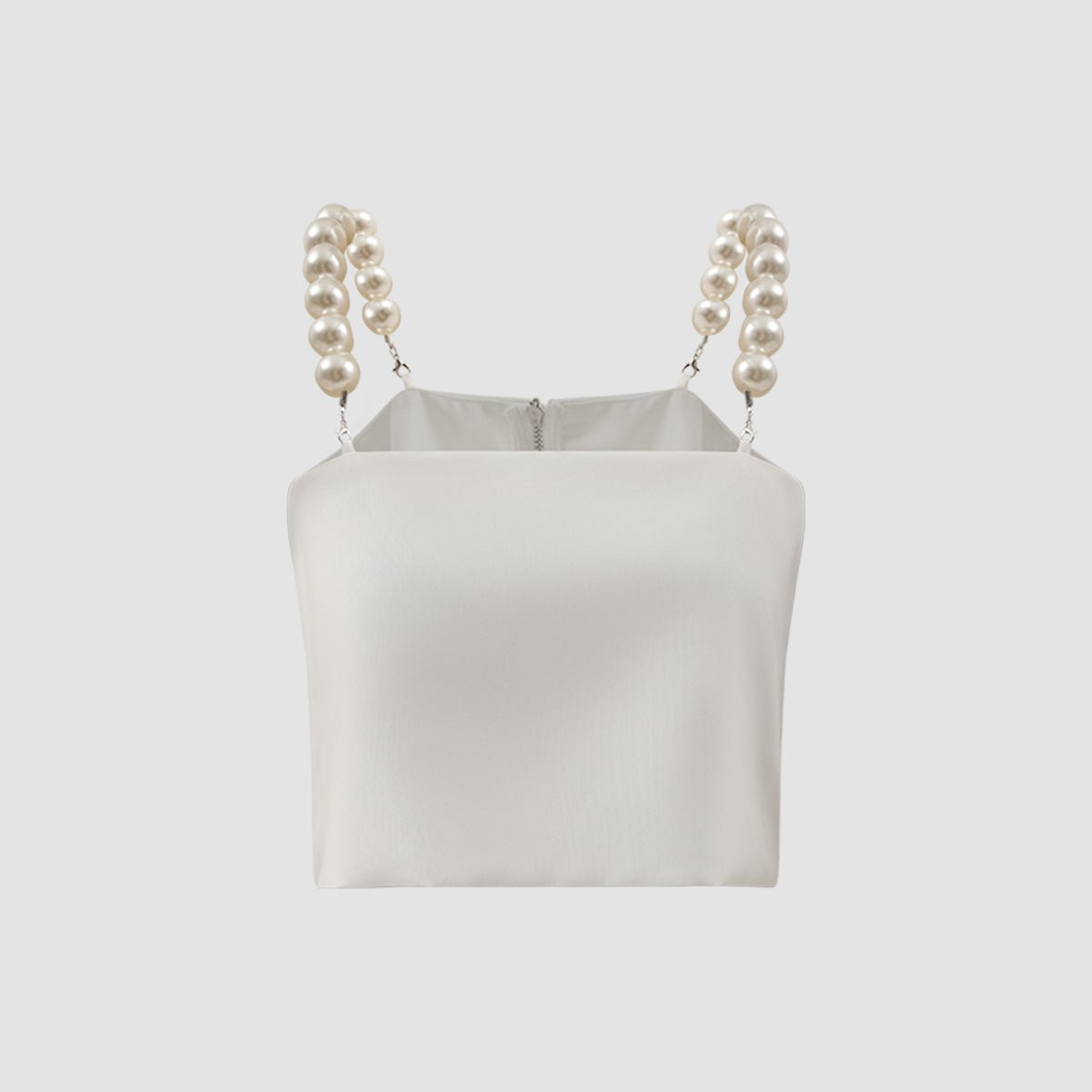 The white top on its own, front view, straight neckline and bead straps