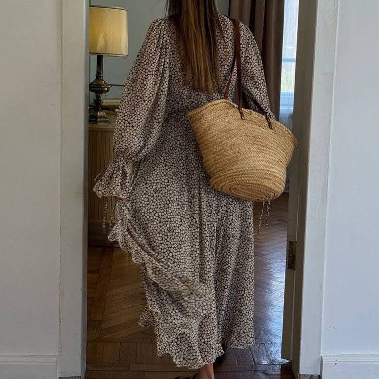 Back view of the cream and brown spot print version with a straw tote, not the version we sell