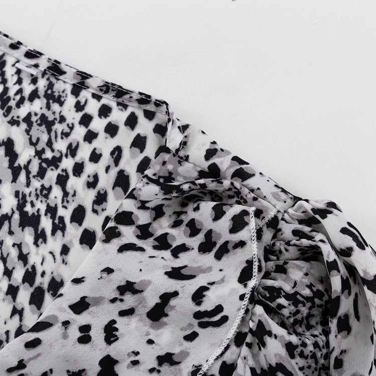 Close-up of the black and white spot print and a ruffled edge
