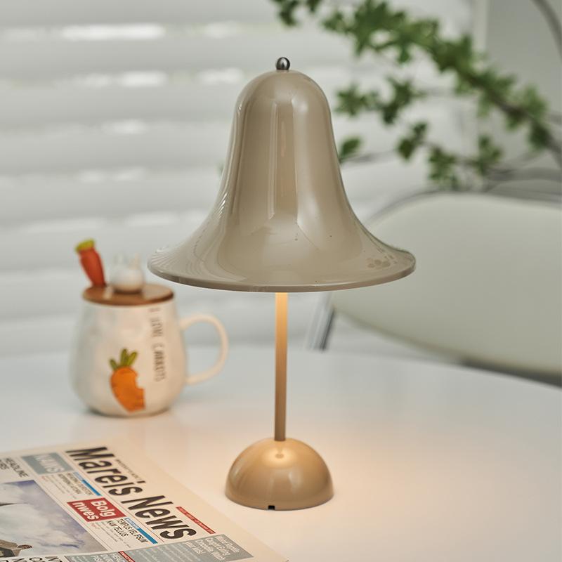 Vintage-style desk lamp with bell shade and built-in charging port on wooden base