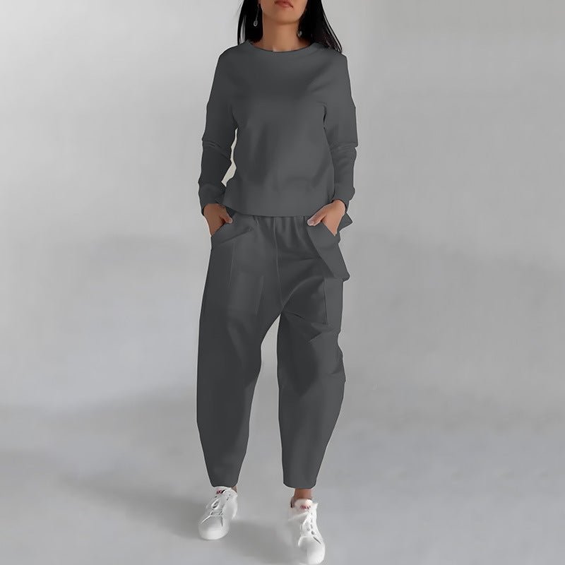 Grey round-neck sweatshirt and jogger trousers set, front view on model