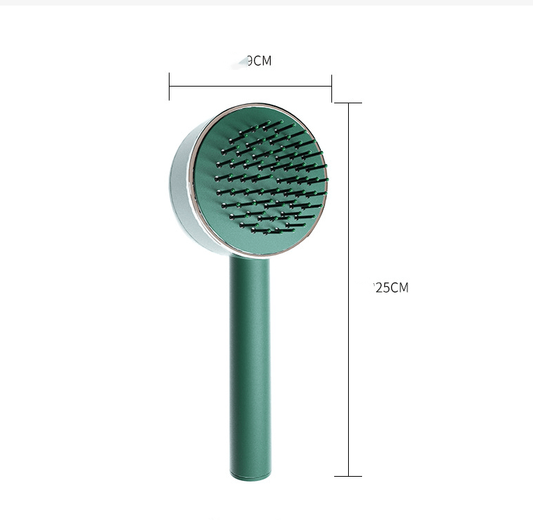 Green hairbrush with measurements: 25 cm long, head 9 cm across