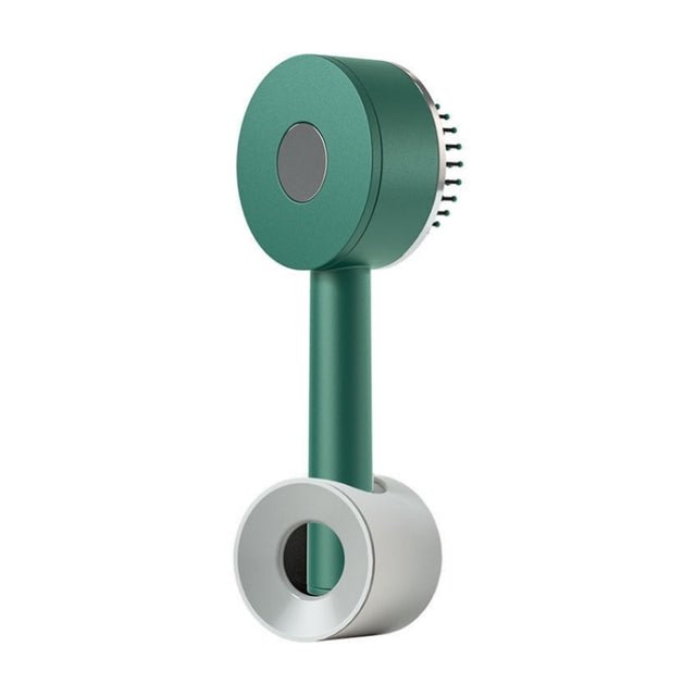 Green hairbrush standing in a grey ring-shaped holder