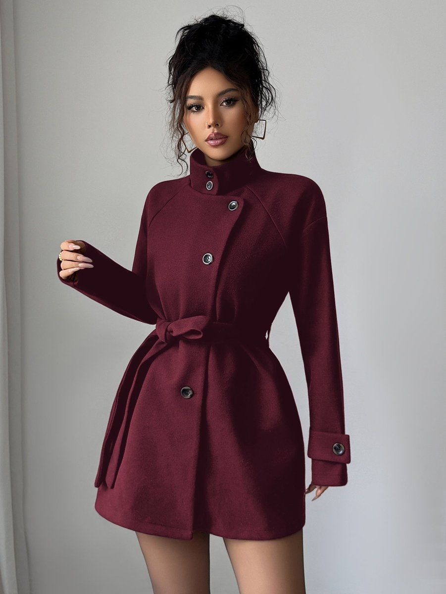 Wine red coat with buttoned cuff tabs and flared hem