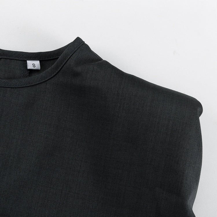Neckband and shoulder seam of the top, laid flat