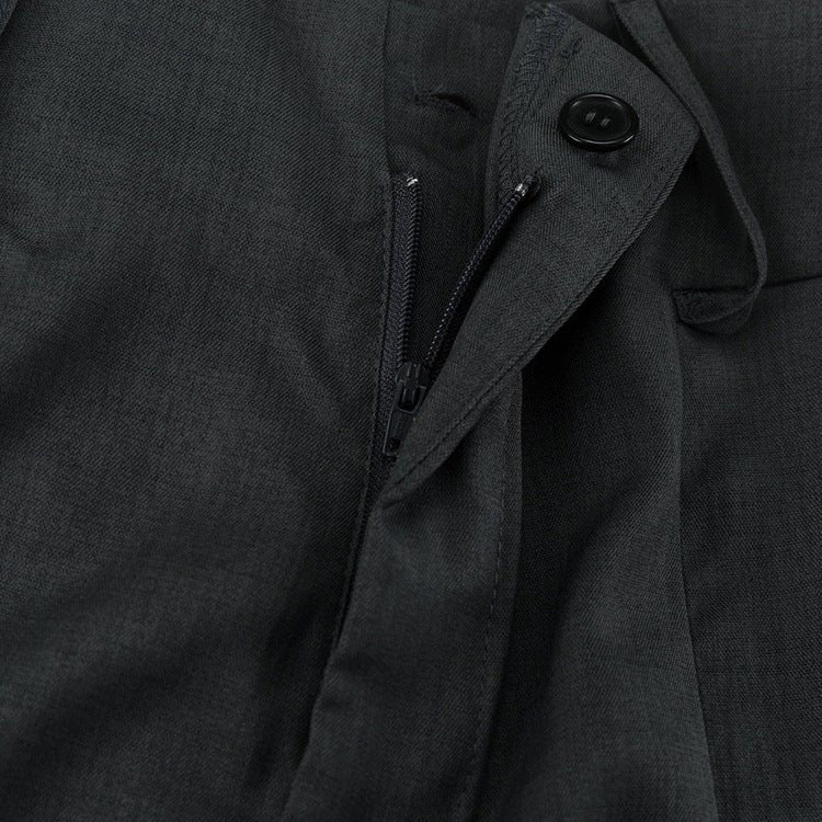 Open front zip and button of the trousers