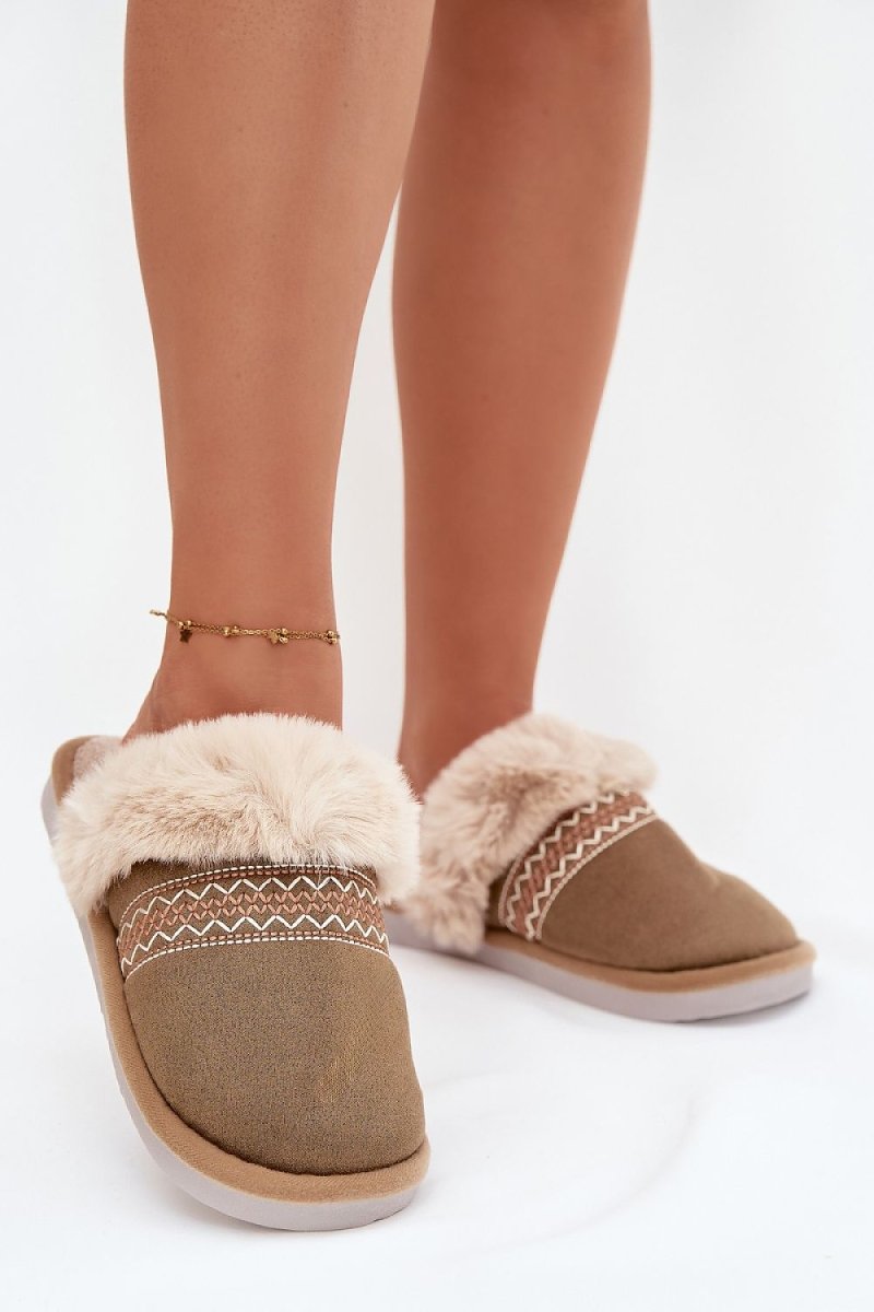 Green fur slippers showcasing soft texture