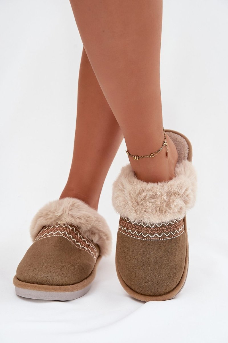 Close-up of plush fur lining and ergonomic sole